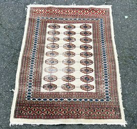 A Vintage Bokhara Hand Knotted And Dyed Wool Rug