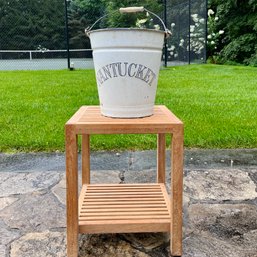 A Teak Table With Vintage Nantucket Enamel Ware Bucket