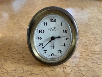 Pair Of Seth Thomas Brass Oval Eight Day Tabletop Alarm Clocks