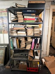 A Metal Storage Shelf And Contents - Books, 1940's Auto Manuals, Copper Pots And More!