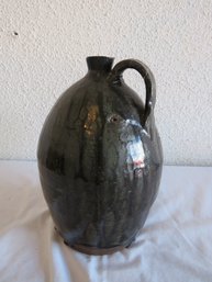 Antique Dark Brown Stoneware Jug With Glazed Finish