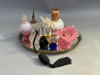 Perfume Bottle Collection On Mirrored Tray