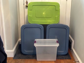 A Small Stack Of Storage Tubs With Lids