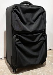 A Mandarina Duck Rolling Suitcase