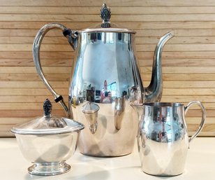 A Vintage Paul Revere Reproduction Silver Plated Tea Service