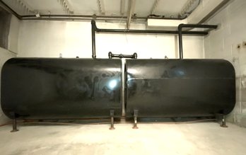 A Pair Of 330 Gallon Above Ground Oil Tanks