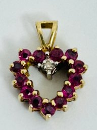 SMALL PRETTY 10K GOLD REVERSIBLE PINK AND BLUE SAPPHIRE HEART PENDANT WITH DIAMOND ACCENT