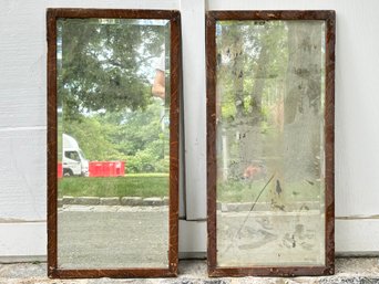 A Pair Of Antique Oak Framed Beveled Mirrors