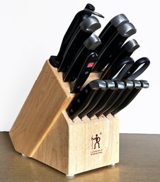 A Henckles Knife Set And Block