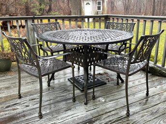 A Cast Aluminum Dining Table And Set Of 4 Chairs By Cast Classics