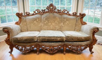An Early 19th Century Victorian Carved Walnut And Fruitwood Settee, Or Sofa