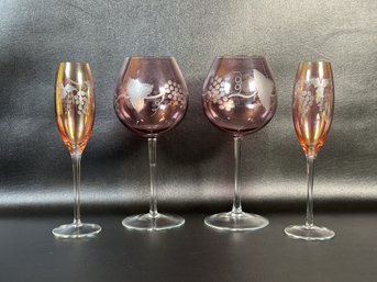 A Selection Of Vintage Stemware In Tinted, Etched Glass