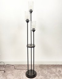 A Contemporary Bronze Standing Lamp - 3 Lite With Glass Shades