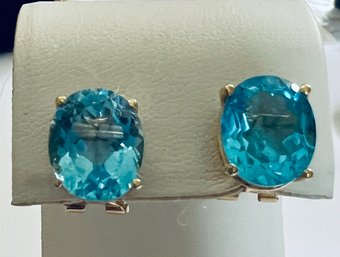 14K GOLD BLUE TOPAZ FACATED OVAL EARRINGS