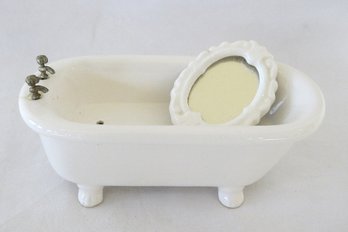 White Ceramic Claw Footed Bathtub And Mirror