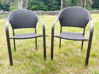 A Pair Of Woven Outdoor Chairs By Hampton Bay