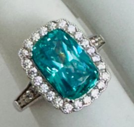 PRETTY STERLING SILVER TEAL & WHITE CZ RING