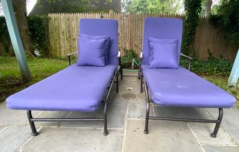 Pair Of Wheeled Wrought Iron Chaise Lounges With Blue Cushions