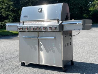 A Gleaming Stainless Steel Weber Summit Grill With Cover - Natural Gas