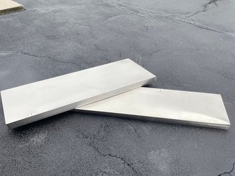 A Pair Of Stainless Steel Countertop Pieces - Perfect For Your Next Project