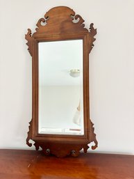 A Scrolled Mahogany Mirror