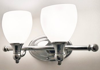 A Chrome And Frosted Glass Wall Sconce