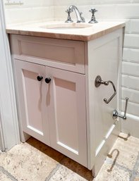 A Luxe Bath Vanity With Marble Top And Nickolazzi Fittings