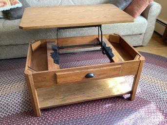 Coffee Table With Adjustable Height Top Piece