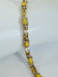 SIGNED FAS GOLD OVER STERLING SILVER YELLOW OPAL LINK BRACELET WITH 3 DIAMOND ACCENTS