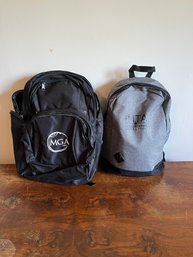 A Pair Of Back Packs - MGA Golf & Modeling Backpacks & More
