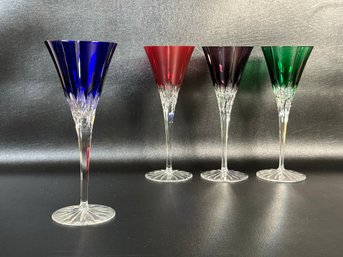 A Stunning Set Of Cut Crystal Stemware With Jewel-Toned Bowls