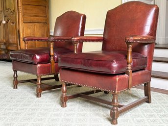 A Pair Of Antique Leather Arm Chairs In Spanish Revival Style