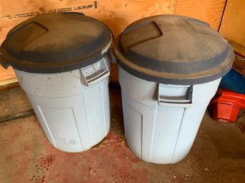 Pair Of Rubbermaid Trash Cans