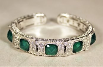 Fancy Judith Ripka Sterling Silver Cuff Bracelet Having Large Green Stones