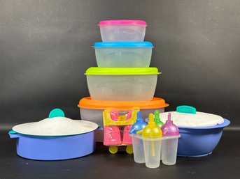 An Assortment Of Plastic Storage, Cookware & More