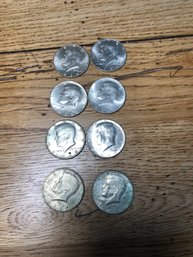 8 Kennedy Half-Dollars - 3-1964, 1-1965,2-1966 & 2-1969.  Lot F