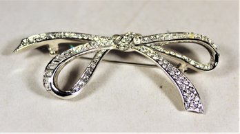 Large Signed Nolan Miller White Rhinestone Bow Formed Brooch