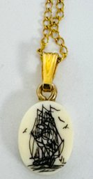 SMALL VINTAGE SCRIMSHAW PENDANT OF SHIP ON 14K GOLD-FILLED CHAIN