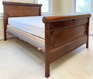 An Early 20th Century Oak Full Bedstead