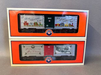 NIB Lionel Trains: 2013 O Gauge Christmas Box Car & 2012 Christmas Box Car, 6-39364 & 7-29976