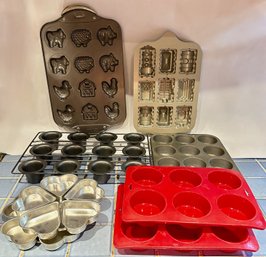 8 Baking Pans: Cakelet Pans, Silicone Cupcake Pans, Heart Shaped Pan & More, Mostly New, Some By Nordic Ware