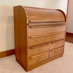 A Danish MCM Teak Rolltop Desk