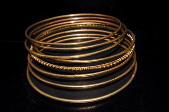 8 Beautiful Gold Tone Bangle Bracelets