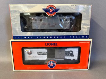 NIB Lionel Trains: Lehigh Valley Pprthole Caboose & 2006 Toy Fair Box Car, 6-19790 & 6-29937