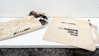 A Set Of 9 Linen 'Dirty Laundry' Bags