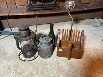 A DIETZ LANTERN, ANTIQUE CREAM CONTAINER, OLD BOTTLE, AND LAMP
