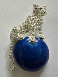 SIGNED NAPIER BLUE ENAMEL RHINESTONE DUTCHESS OF WINDSOR PANTHER ON BALL BROOCH