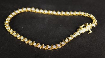 Gold Over Sterling Silver Fine Tennis Bracelet Having White Stones 7' Long