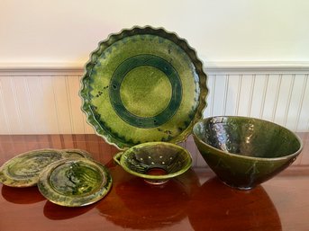 A Collection Of Spanish Handmade Green Pottery