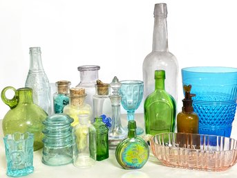 A Large Variety Of Vintage And Antique Glass Vessels